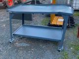 DAMAGED 60 INCH STEEL WORK BENCH ON CASTORS