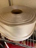 1 ROLL OF WHAT LOOKS LIKE SOME KIND OF PACKING STRAPPING
