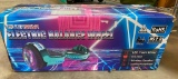 HOVERSTAR ELECTIC BALANCE WHEEL BOARD WITH WIRELESS SPEAKER, CHROME PINK