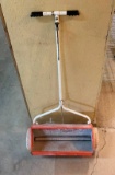LOOKS LIKE A WALK-BEHIND LIME SPREADER