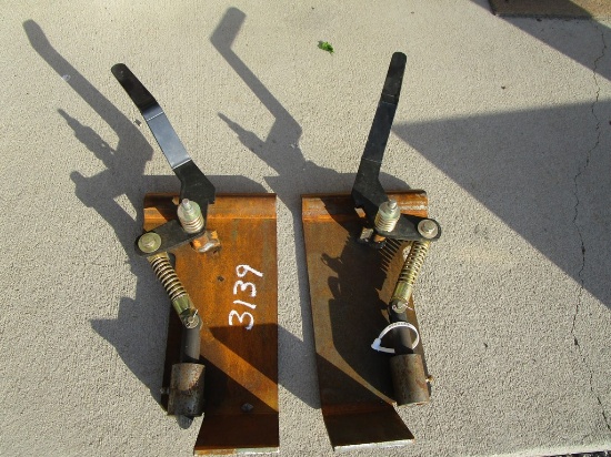 Skidsteer Latches