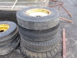 4) USED SPREADER TIRES + RIMS