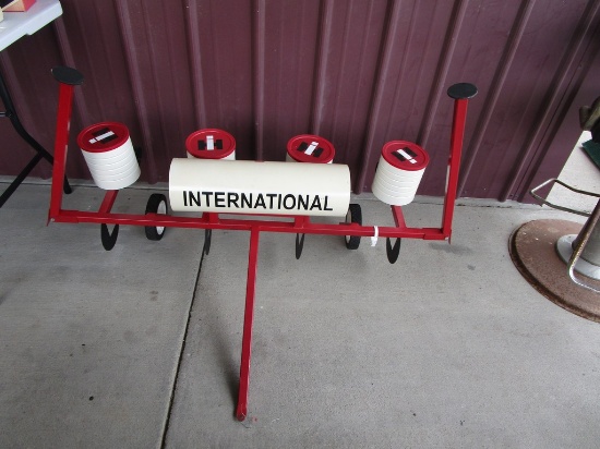 RED TOY CORN PLANTER