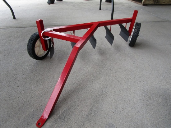 RED TOY PLOW