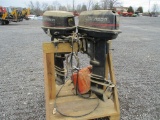 2) JOHNSON 25 HP BOAT MOTORS W/STAND