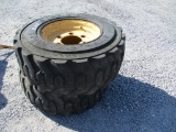2) USED 12-16.5 TIRES & RIMS