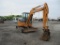 CASE CX55B 2571 HRS, AUX HYD, CHA, PUSH BLADE, S/N NGTN55951. RUNS AND DRIVES