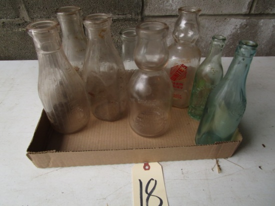 6 Milk Bottles and 2 Pop Bottles