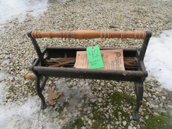 Newspaper roller