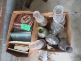 Oil lamps, books