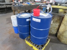 Hydraulic oil (approx. 1/4 full), steel drums