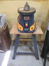 Oscillating spindle sander