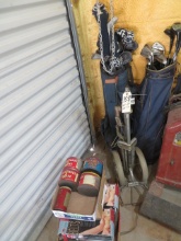 Golf clubs, advertising tins