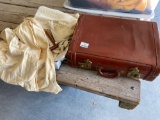 Suitcase with linens and rice bag