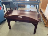 Coffee table with folding side