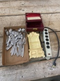 Silverware, jewelry box, power strip