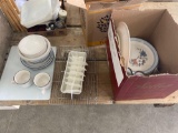 Plates, cups, racks, glasses, cutting board