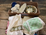 Potholders, kitchen towels, plates, misc.