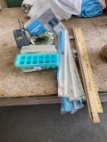 Iron, ice trays, curtain rods, rulers