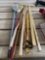 T square, walking sticks, cane, rulers, brooms