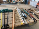 Snow shovels, broom, walking sticks, buck saw, ax, misc.