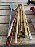 T square, walking sticks, cane, rulers, brooms
