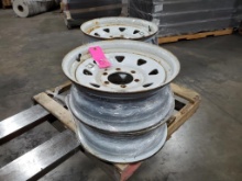 Qty 4 - white steel trailer rims.