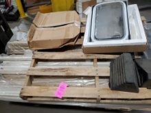 Assorted RV shades and window trim parts.