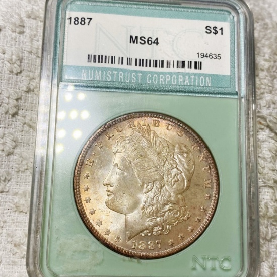 1887 Morgan Silver Dollar NTC - MS64