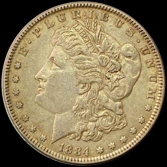 1884 Morgan Silver Dollar ABOUT UNCIRCULATED
