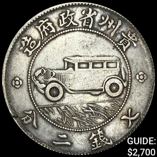 China Silver Auto Dollar NEARLY UNCIRCULATED