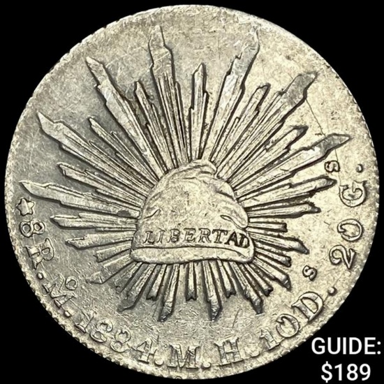1884Mo MH Mexico Silver 8 Reales Cap&Rays NEARLY UNCIRCULATED