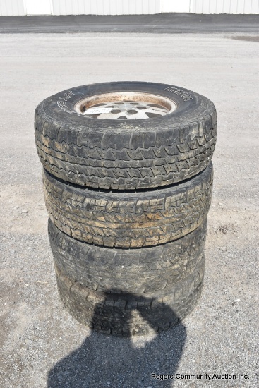4 - Lt265/75r16 Tires On Chevy Wheels