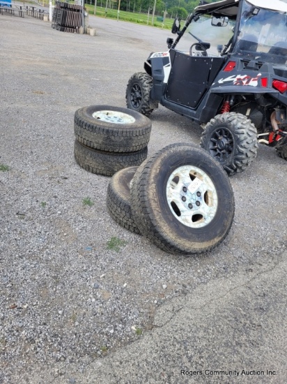 4 - 265x75r16 Truck Tires On Chevy Wheels