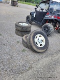 4 - 265x75r16 Truck Tires On Chevy Wheels