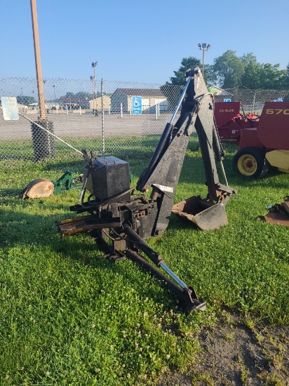 National Backhoe Attachment w/ Manual In Office