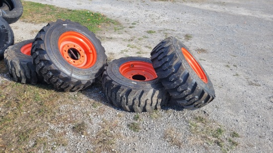 4 - 12-16.5 Slid Loader Tires on New Bobcat Wheels