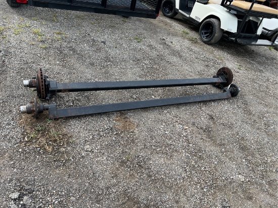 2 Axles with disc brakes (5 Lug pattern) 86 3/4 Hub