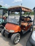 Orange EZ Go Freedom RXV Golf Cart