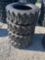 (4) 10-16.5 SKS1 Skid steer tire