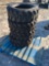 (4) SKS-1 10-16.5 N.H.S Skid steer tires