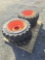 4 Forerunner 10-16.5 N.H.S. Skid Loader Tires - New on Bobcat Wheels