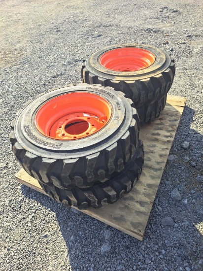 4 Forerunner 10-16.5 N.H.S. Skid Loader Tires - New on Bobcat Wheels