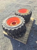 4 Forerunner 10-16.5 N.H.S. Skid Loader Tires - New on Bobcat Wheels