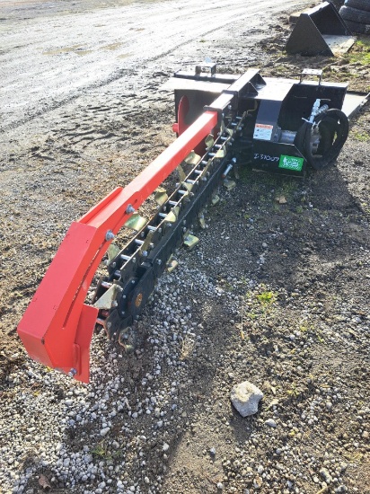 Raytree skid steer trencher attachment