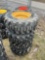 (4) Forerunner 12-16.5 Skid Steer tires w/ NH, JD, CAT rims