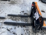 Wolverine Hydraulic adjustable pallet fork attachment