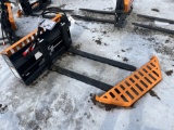 Wolverine Hydraulic adjustable pallet fork attachment