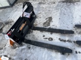 Wolverine Hydraulic adjustable pallet fork attachment