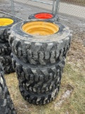 (4) Forerunner 12-16.5 Skid Steer tires w/ NH, JD, CAT rims